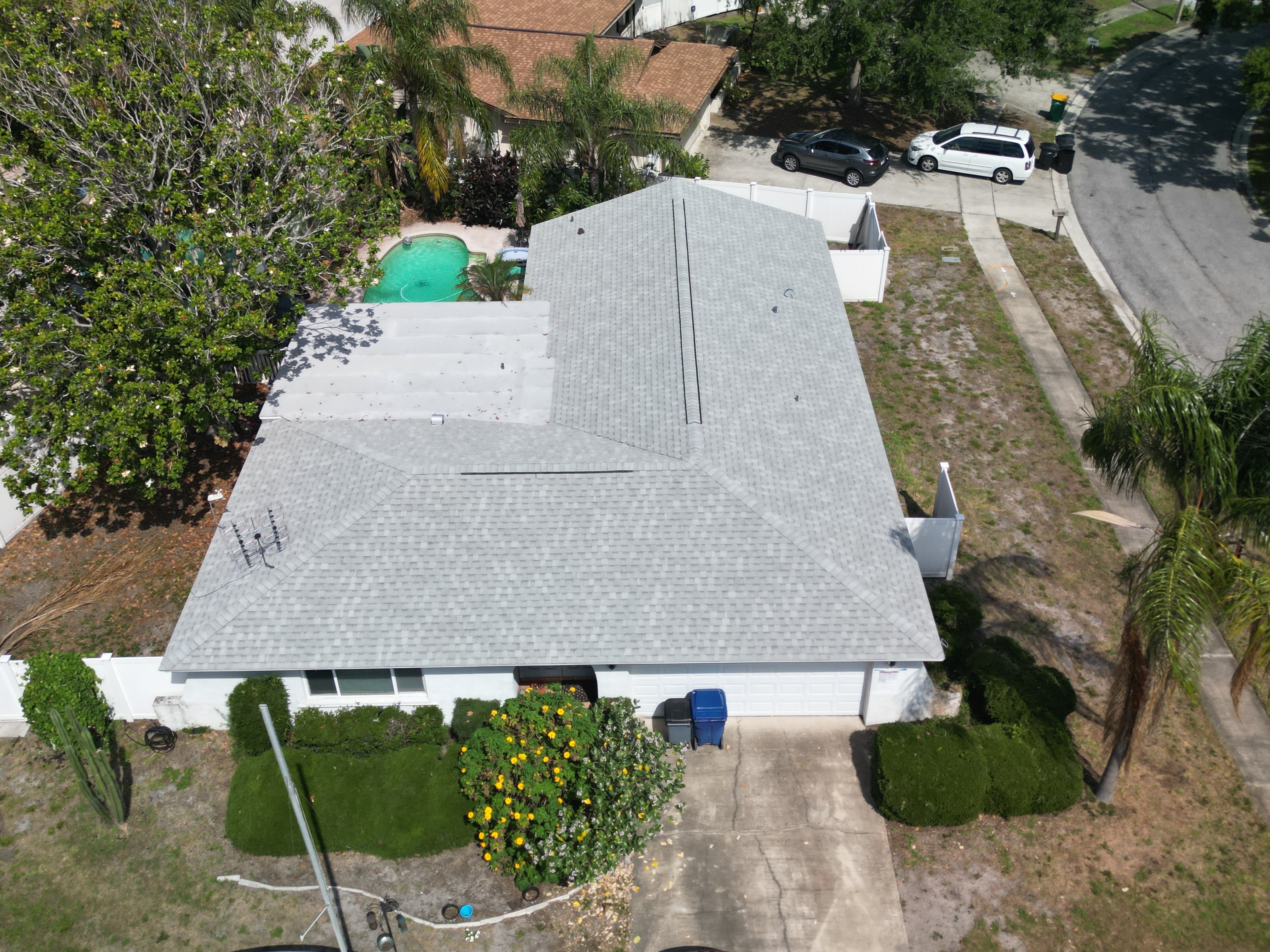 Completed tan architectural shingle roof