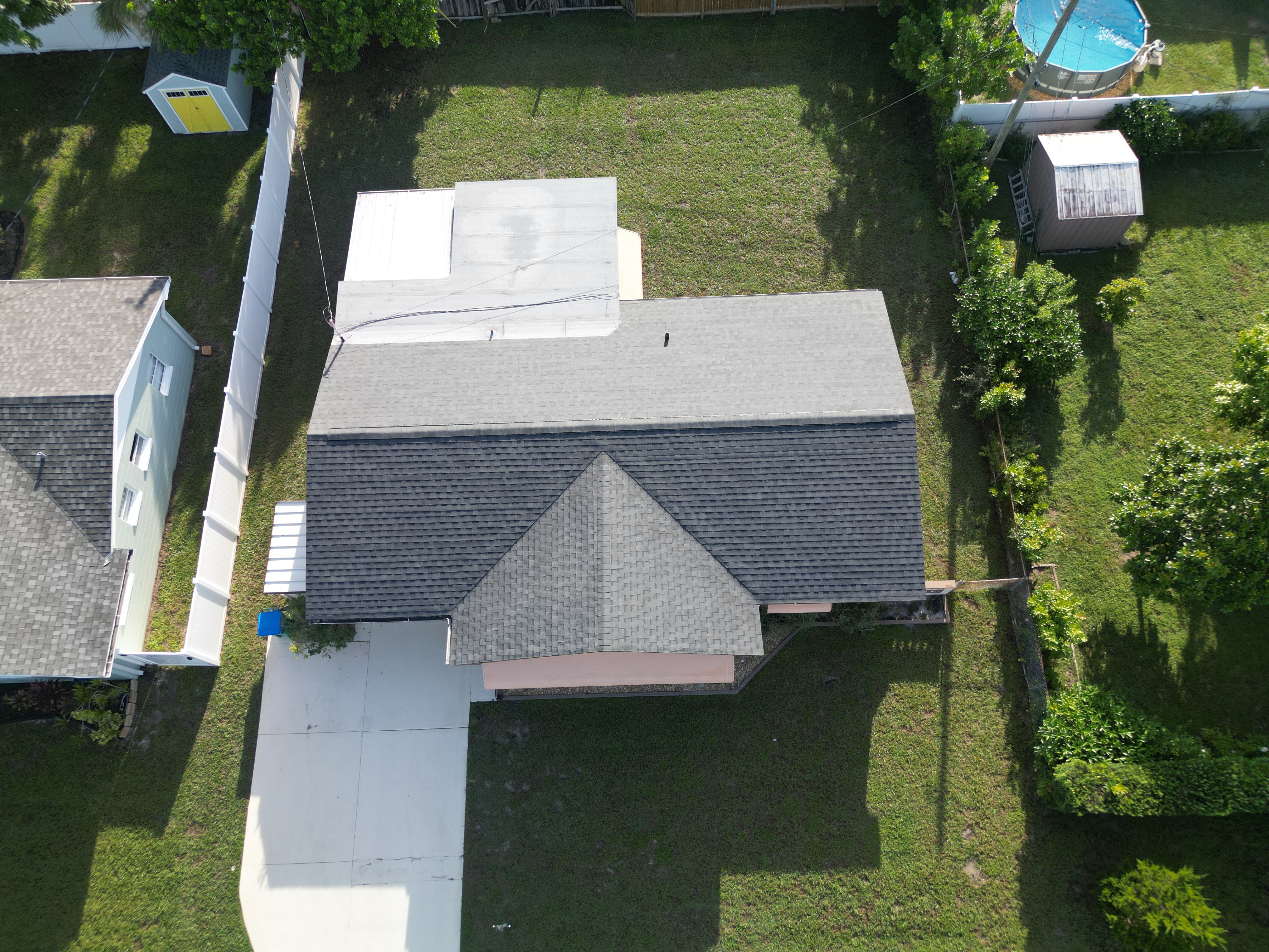 Finished light-gray shingle roof, aerial view