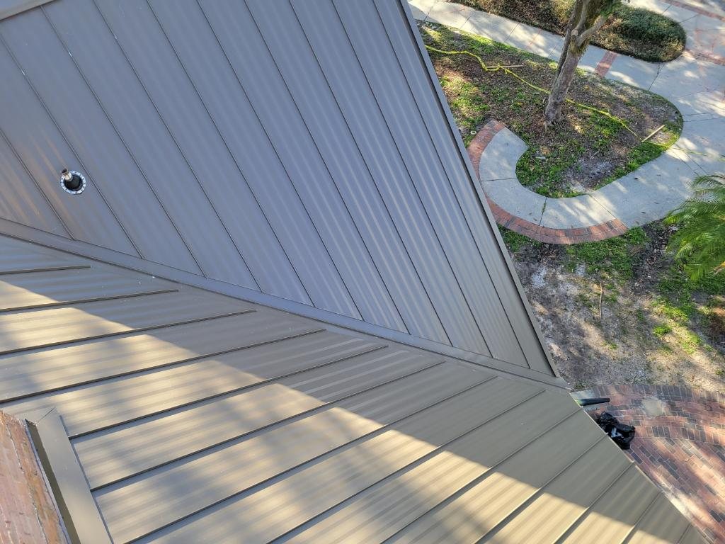 Close-up of bronze standing seam metal roof panels