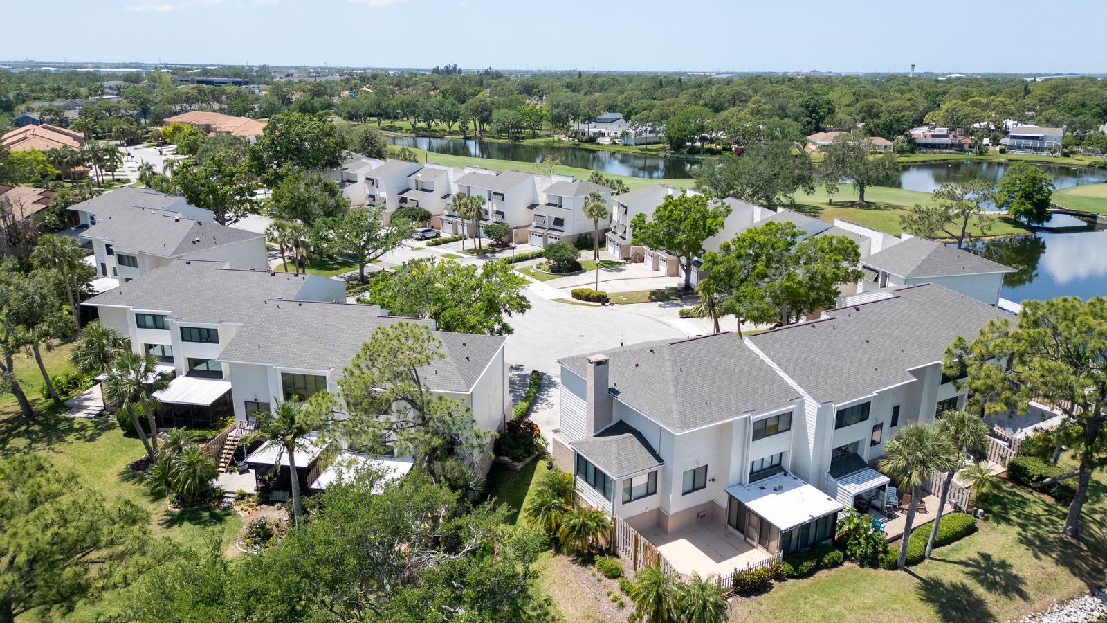 Drone view of townhouse buildings along the water